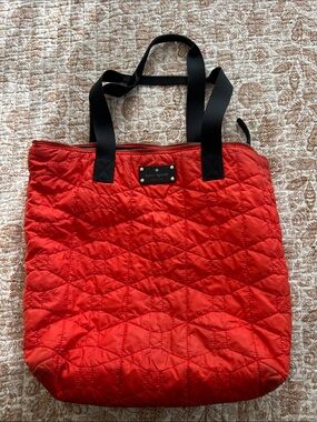 kate spade tangerine Quilted Tote with Black Handles